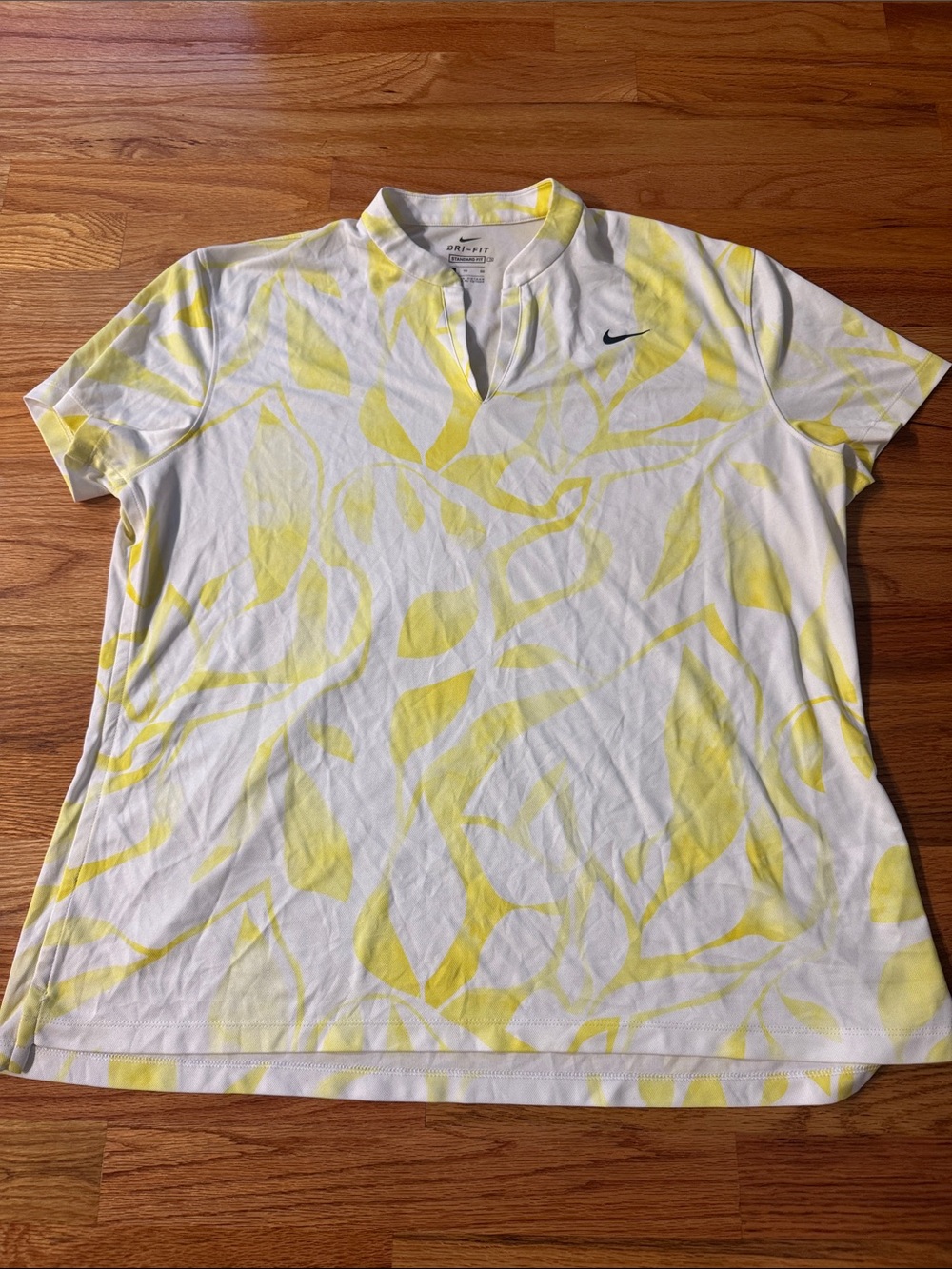 Nike Women’s White Short-Sleeve Tee with Yellow Leaf Print